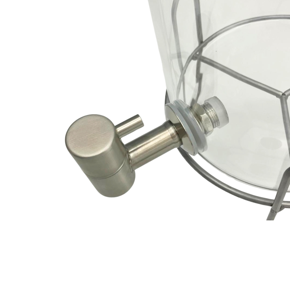 Sunnex 3L Glass Juice Dispenser with durable SS304 stainless steel faucet. Features a built-in mesh filter to prevent clogging. Ideal for hotels and buffets.